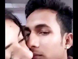 Girlfriend boyfriend kissing involving a region